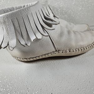 Taos vintage white leather moccasins.